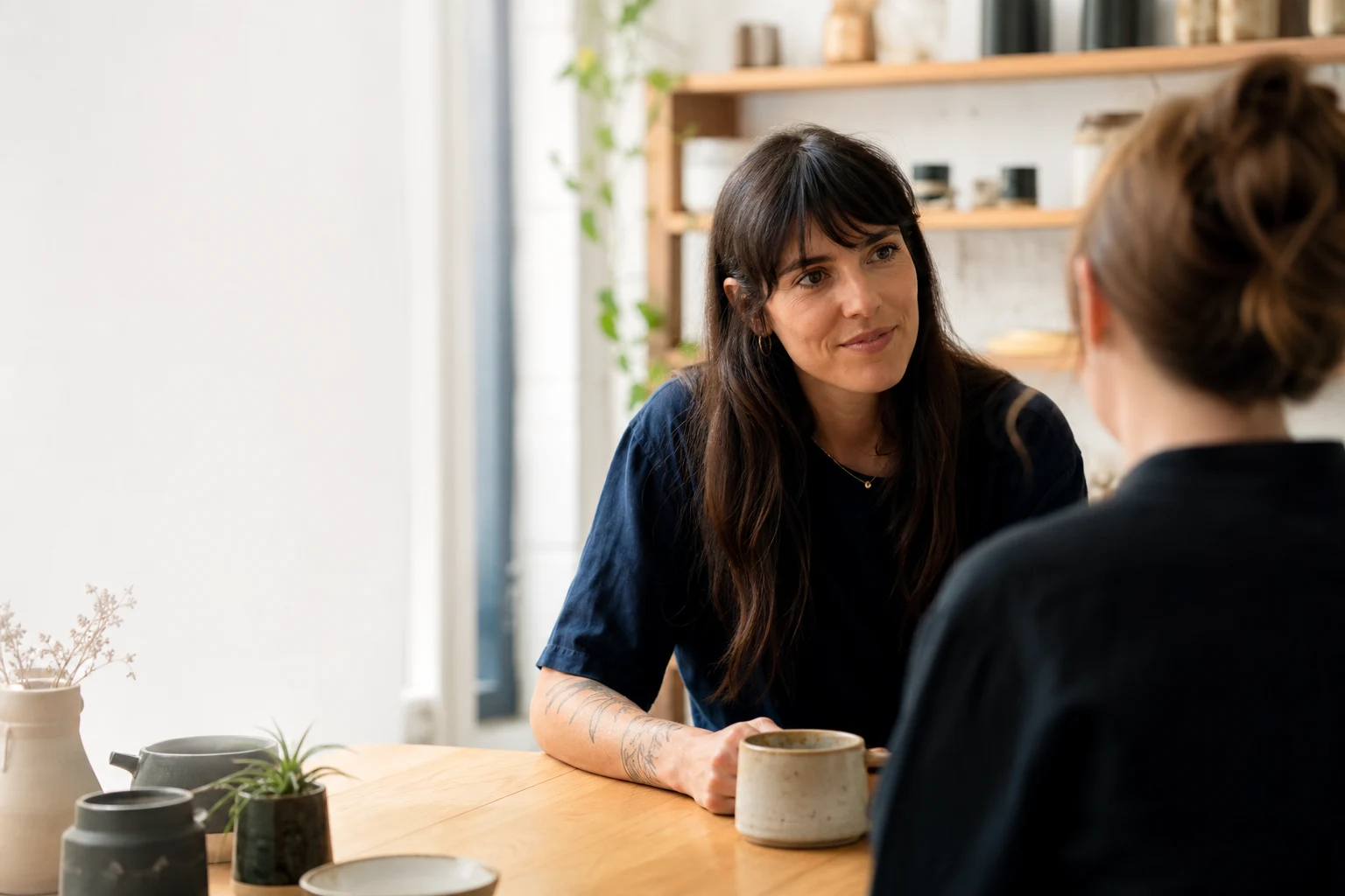 Business owner smiling while connecting with her audience